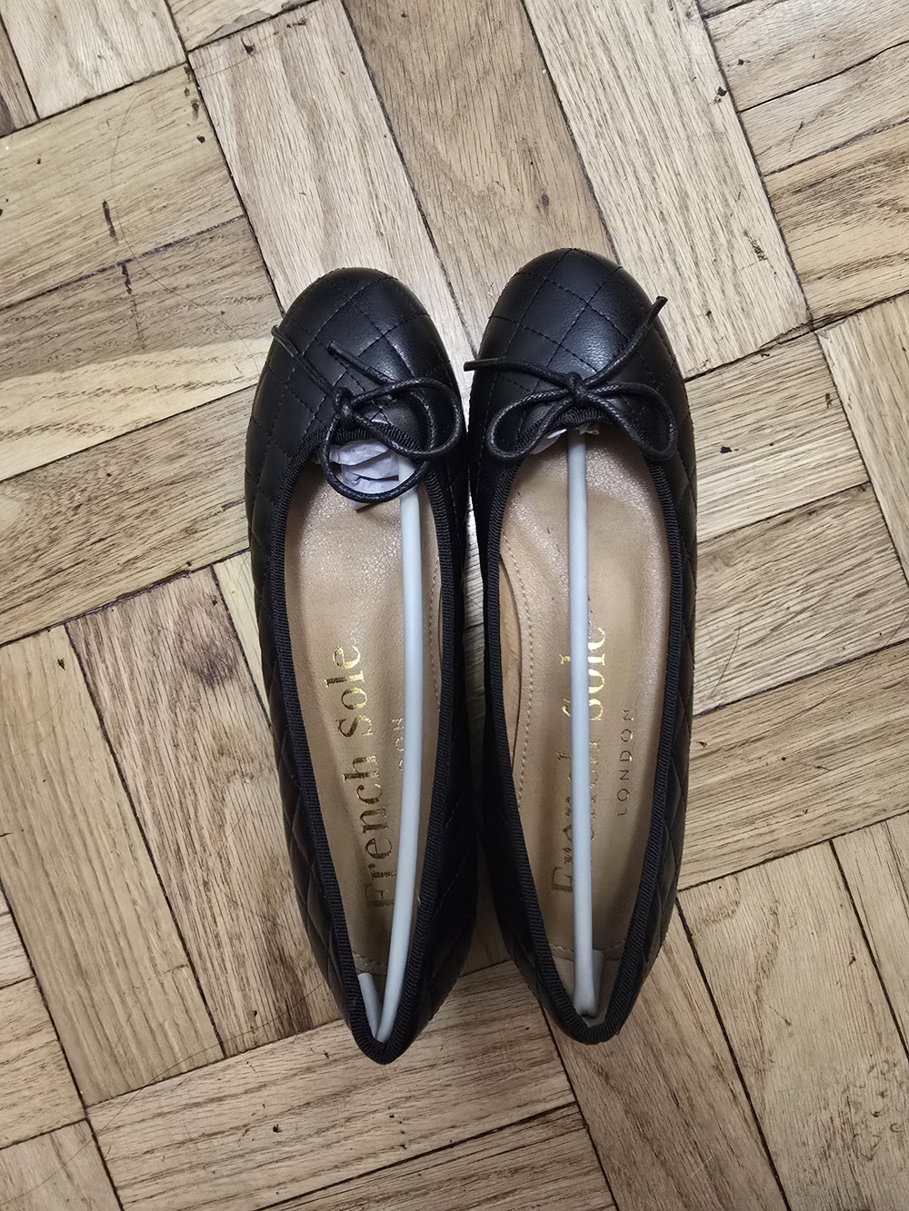French Sole Black Quilted Ballet Flats with Bow Trim